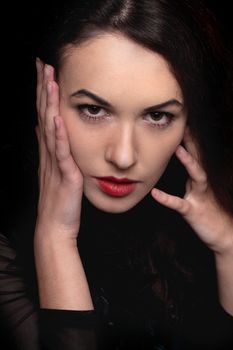 Closeup portrait of passionate young woman. Isolated