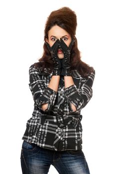 Portrait of frightened young woman in a checkered jacket
