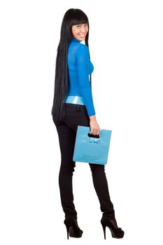 Pretty girl with a blue handbag. Isolated