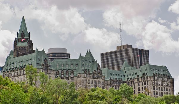 The canadian Parliament Confederation Building facing the Ottawa river in Ottawa, Canada.