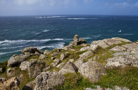 The magnificent view of the Atlantic Ocean from Land's End in Cornwall, England.  The Longships Lighthouse can be seen in the distance.