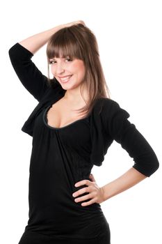 Beautiful brunette in black dress posing. Isolated on white