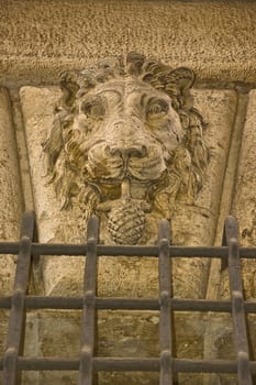 lion decoration on old building in Rome, Italy