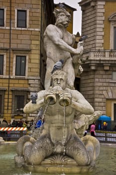 marble detail of Nettuno Fountain in Piazza Navona, Rome