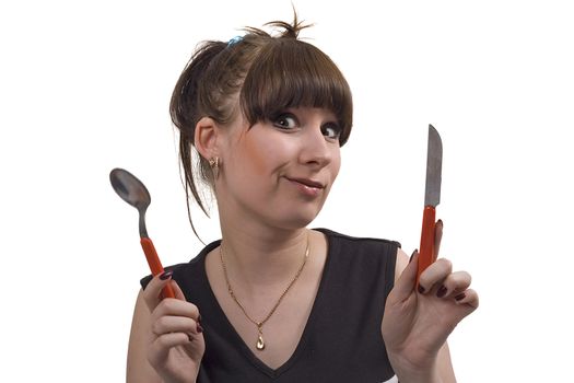The mad housewife with knife and spoon. funny picture