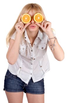 Portrait of the funny girl with oranges. Isolated