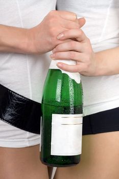 Two girls with a champagne bottle in a hands