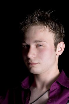 portrait of the young man. Isolated on black background