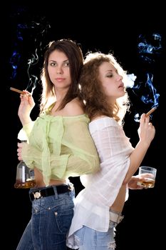 Portrait of the two girlfriends with a cigars