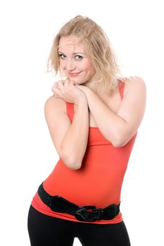Playful smiling blonde in red t-shirt. Isolated on white