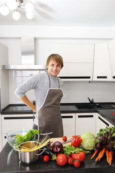 Man cooking in modern kitchen