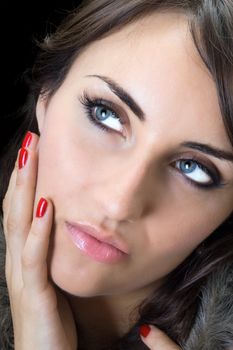 Portrait of pretty woman with thoughtful look. Isolated
