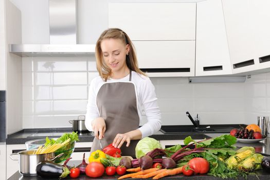 Woman cooking in modern kitchen