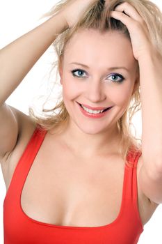 Cheerful blond woman in red t-shirt. Isolated on white