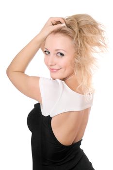 Sexy young blonde playing with her hair. Isolated on white