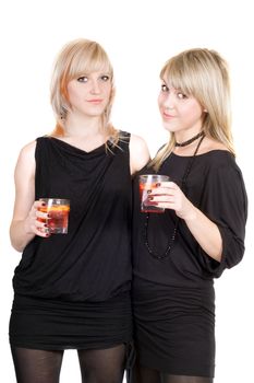 Two young beauty blonde with cocktails. Isolated