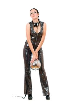 Young sexy brunette with a mirror ball in her hands