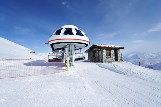 Ski lift station in mountains at winter, Val-d'Isere, Alps, France