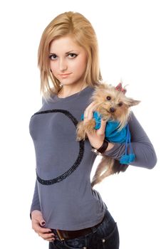 Pretty blonde posing with puppy. Isolated on white