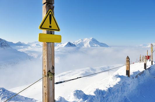 Mountains in clouds with snow in winter, Val-d'Isere, Alps, France