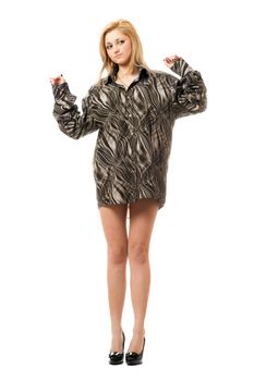 Playful young woman in the men's shirt. Isolated