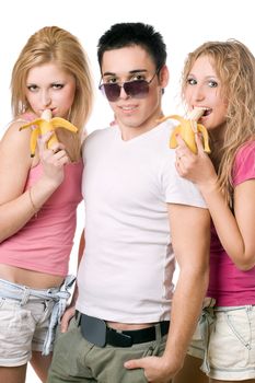 Portrait of three playful young people. Isolated on white