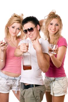 Cheerful young people with a bottle of whiskey