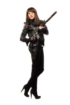 Nice woman in black clothes with gun