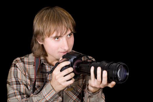 Photographer with the camera with a telefocus lens