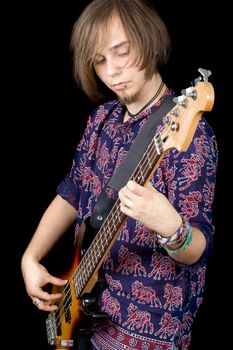 The young man with a guitar. Isolated