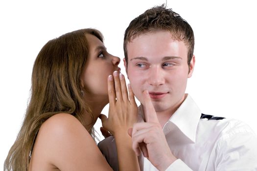 The young woman whispers on an ear to the young man