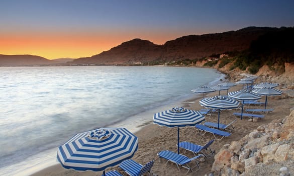 Sunset over Pefkos beach in Rhodes in Greece