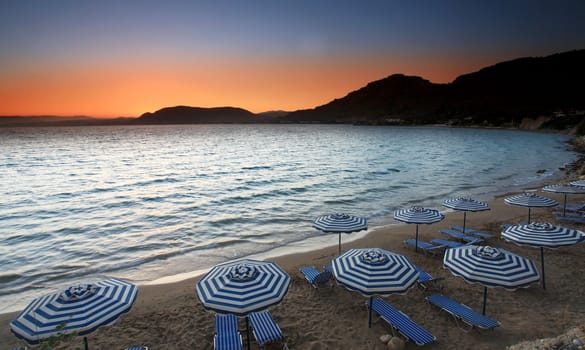 Sunset over Pefkos beach in Rhodes in Greece