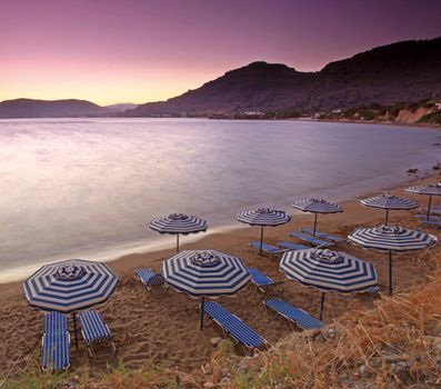 Sunset over Pefkos beach in Rhodes in Greece