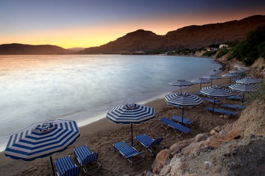 Sunset over Pefkos beach in Rhodes in Greece