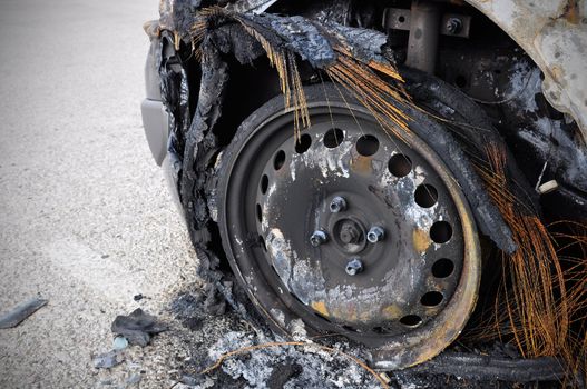 Close up detail of a burnt car in a car accident