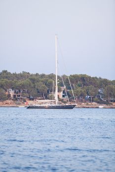fishing boat in summer outside in sea at harbour background
