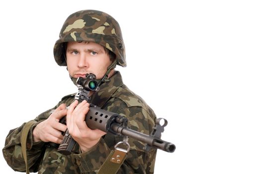 Armed man holding svd in studio. Closeup