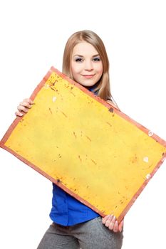 Smiling young woman posing with yellow vintage board. Isolated