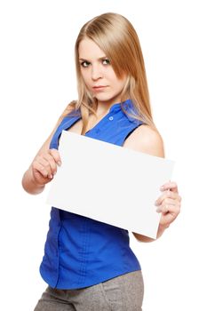 Serious young woman holding empty white board. Isolated