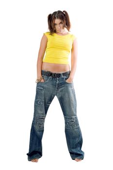 Rapper girl in wide jeans. Isolated on white