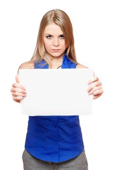 Serious young blonde holding empty white board. Isolated
