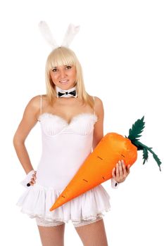 Portrait of attractive sexy young blonde with a carrot