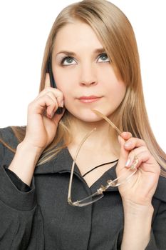 Close-up portrait of thoughtful attractive blonde with phone