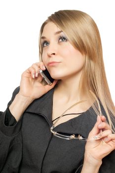 Close-up portrait of thoughtful attractive young blonde with phone