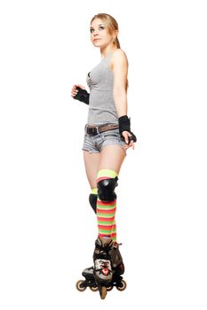 Pretty young blonde on roller skates. Isolated