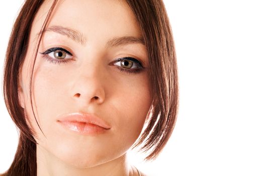 Closeup portrait of a lovely young woman. Isolated