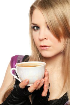 Attractive young blonde with a cup of tea. Isolated