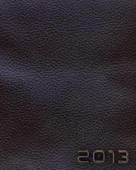 Leather background with 2013 new year label. Vertical orientation. Black.