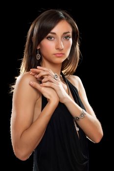 Portrait of a lovely young brunette in black dress